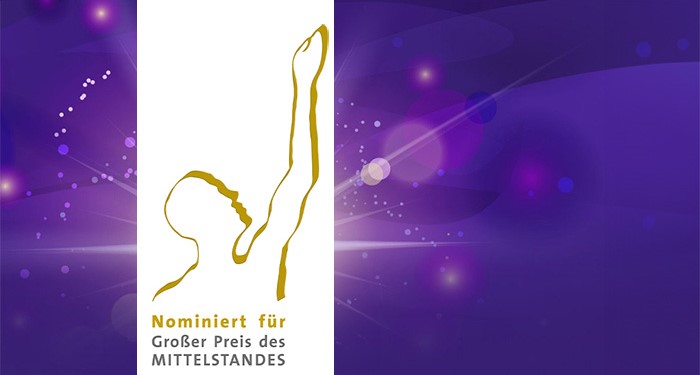Nominierung Großer Preis des Mittelstandes Logo vor lila Hintergrund "Nominiert für Großer Preis des Mittelstandes"